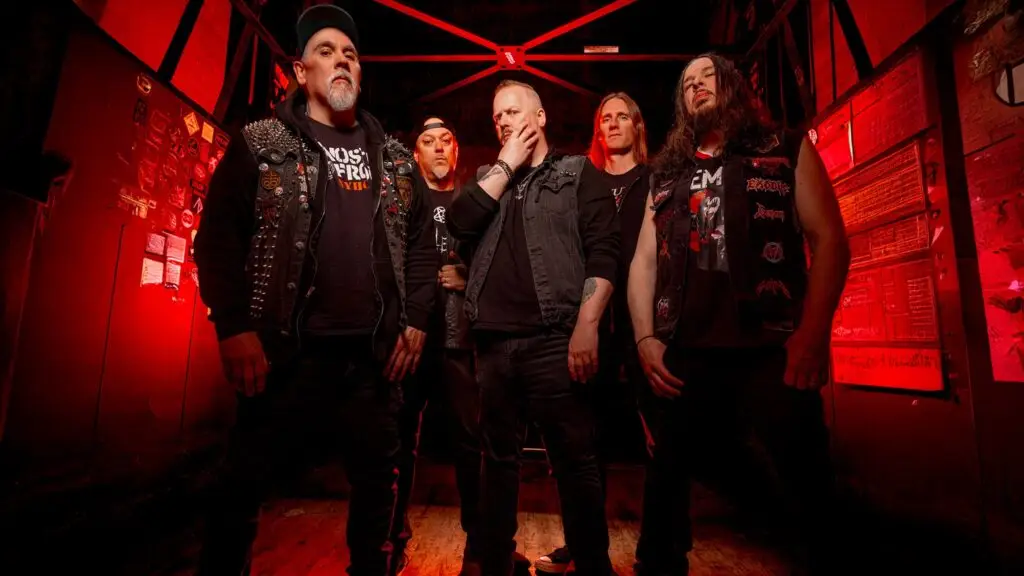 Forbidden five-piece Bay Area thrash metal band in dramatic red-lit press photo