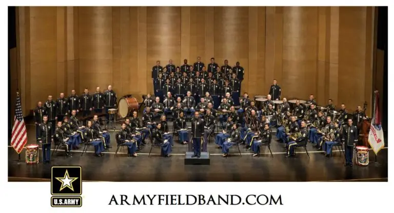 U.S. Army Concert Band performing on stage in formal military dress uniforms