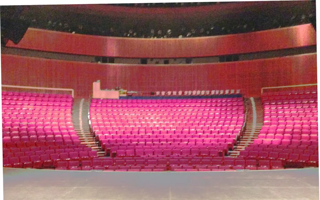 The Hart Theatre auditorium inside The Egg, seen from the stage, with curved rows of red seating