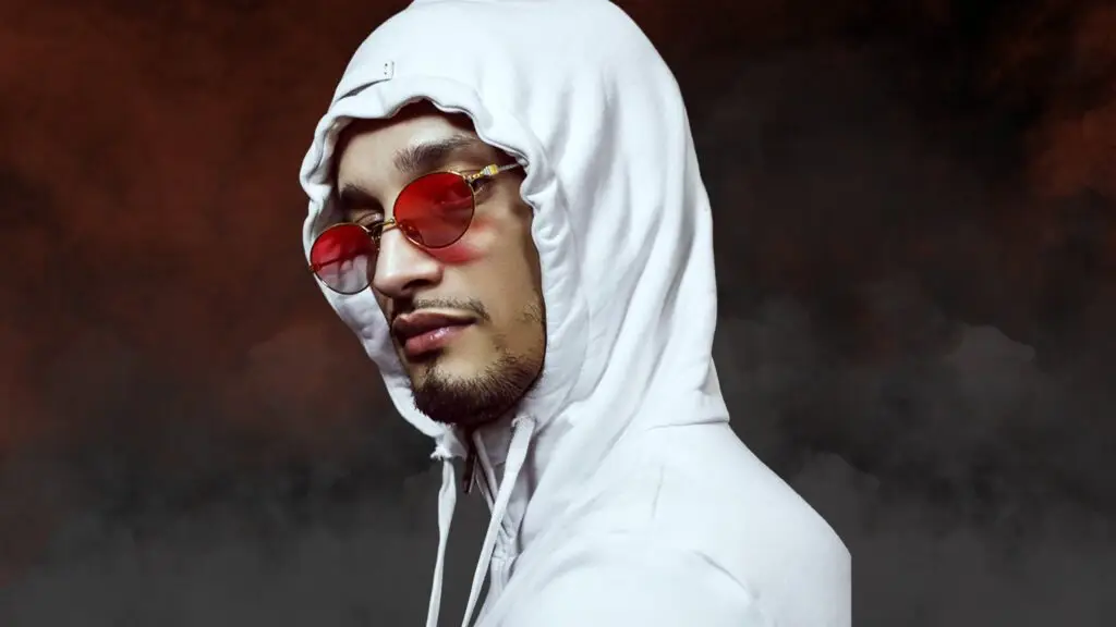 Soolking in white hoodie and red sunglasses, official artist promotional photo