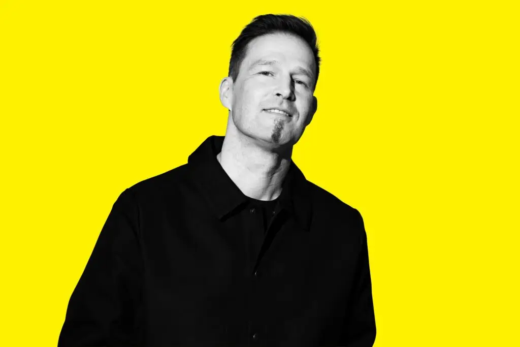 Darude, Finnish trance DJ and producer, in official press photo against yellow background
