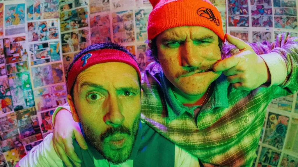 Little Stranger duo promo photo against comic book wall backdrop