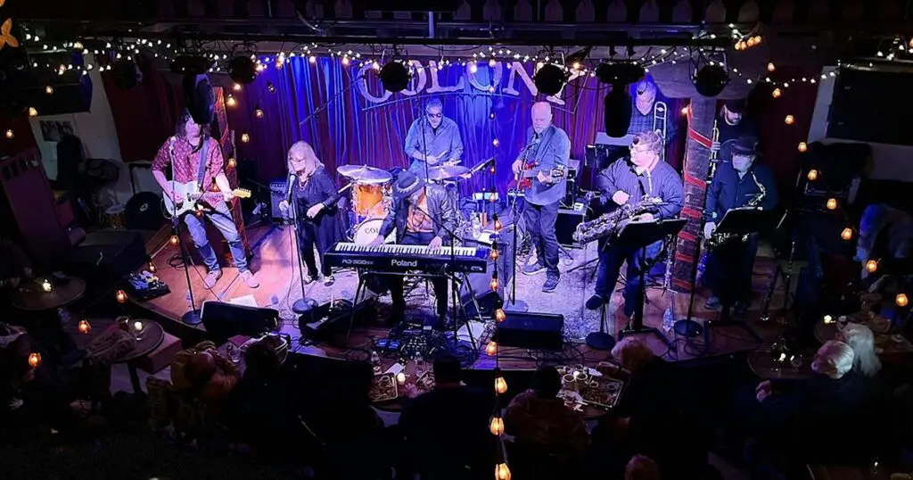 Professor Louie & The Crowmatix performing live at Colony Woodstock, full band with horns on stage