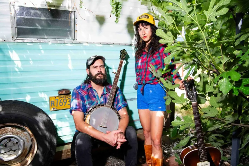 The Lowest Pair — Palmer T. Lee with banjo and Kendl Winter with guitar, press photo by Sarah Cass