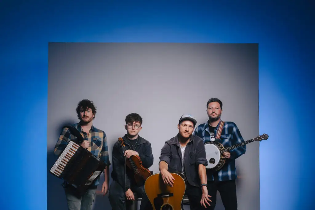 Dallahan — Celtic folk quartet with accordion, fiddle, guitar, and banjo, official press photo