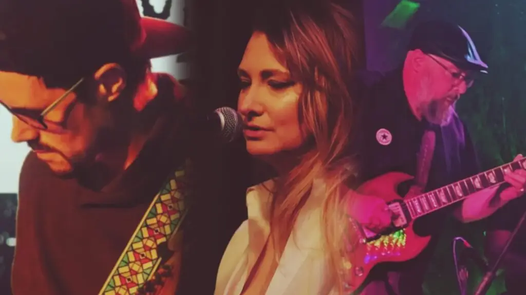 Emily Champion performing with CHAMPION band at a live Rochester venue show
