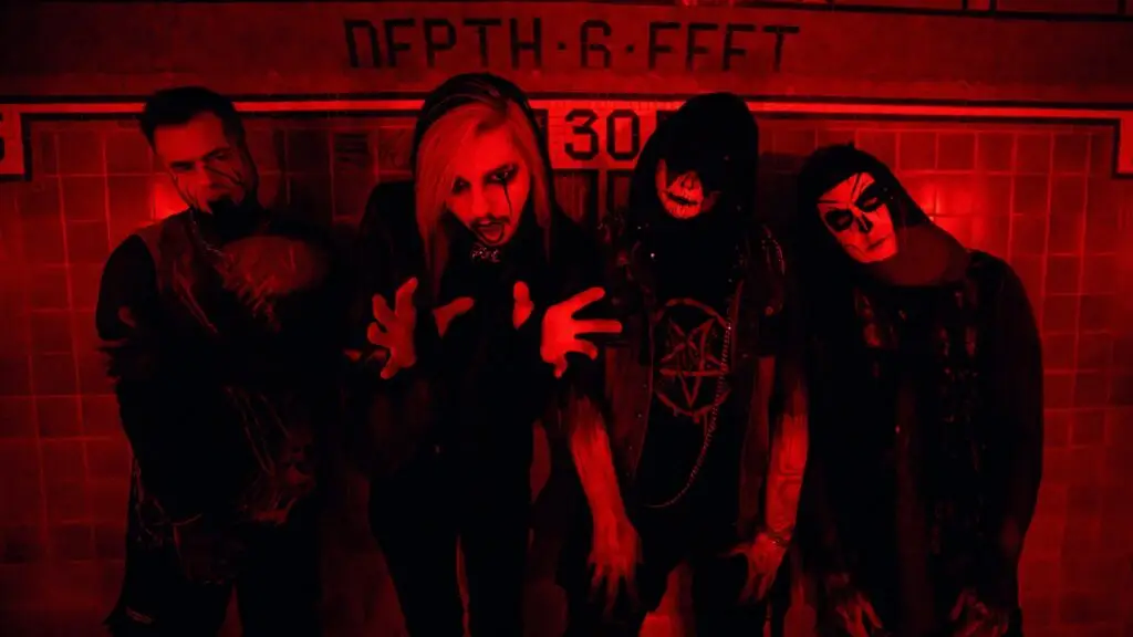 Dark Divine band promo photo, four members in theatrical gothic horror makeup and black costumes